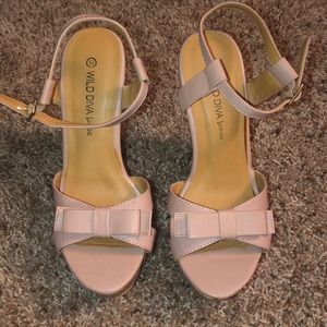 Beige wedged high heels